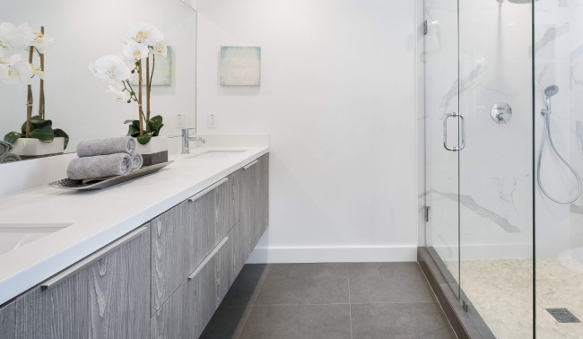 Plastic wall cladding placed around bathroom